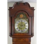 A 19th Century Longcase Clock with arched brass dial, engraved centre, silvered chapter ring,