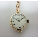 A Lady's 1950's 9ct gold Rolex Wristwatch, the signed silvered dial with engine turned centre,