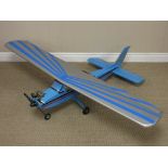 A radio controlled Cesna type blue Aircraft with petrol motor and servos, 5ft 4in wingspan