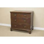 An 18th Century oak Chest with cross-banded top above three long drawers on bracket feet, 2ft 11in