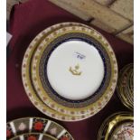 Three Minton armorial Dinner Plates with boar's head crest and motto 'SEMPER IDEM' in lavish gilt