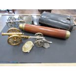 Drawleaf telescope, WD binoculars, brass tobacco tin, two model canons and an Avro Lancaster