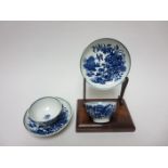 A pair of early Worcester blue and white Tea Bowls printed fence pattern, crescent mark