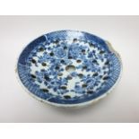 An 18th Century Delft blue and white straining Bowl floral painted, 9in A/F