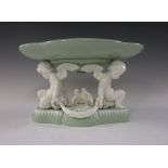 A Minton shaped oval Centre Piece supported by two winged cherubs, having two doves to centre and