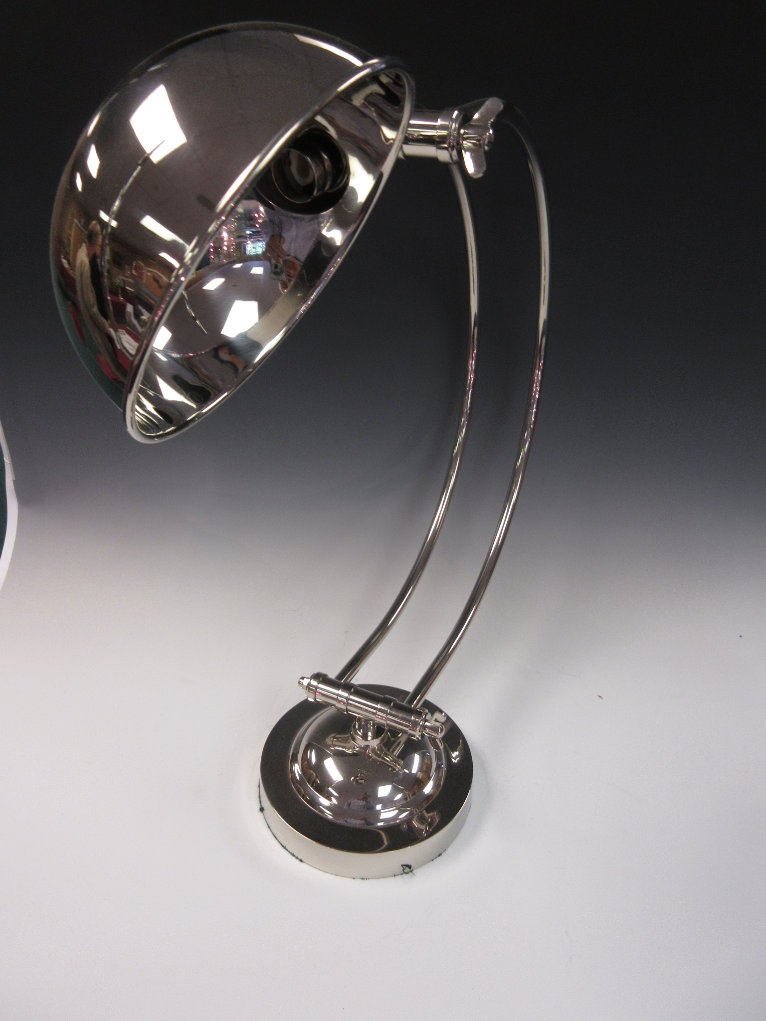 A plated half moon Desk Lamp on circular base, 21in