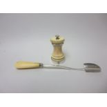 A George III Stilton Scoop with baluster ivory handle. London 1804, and a silver mounted Pepper