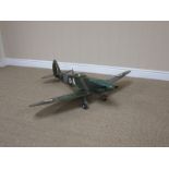 A radio controlled model of Spitfire with servos and petrol engine 3ft 8in wingspan
