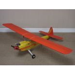 A radio controlled high winged single seater Stunt Aircraft with petrol motor and servos, 5ft 4in