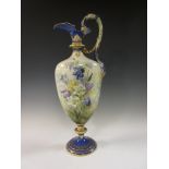 A Royal Worcester Ewer with scroll handle, mask finials, painted Canterbury Bells, in white blue and