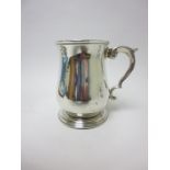 A George II silver baluster Pint Mug with later inscription and scroll handle, London circa 1752