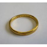 A 22ct gold Wedding Band, approx 5.10gms