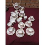 A Crown Staffordshire Coffee Service, viz: Coffee Pot, Cream Jug and Sugar Basin, six Cups and