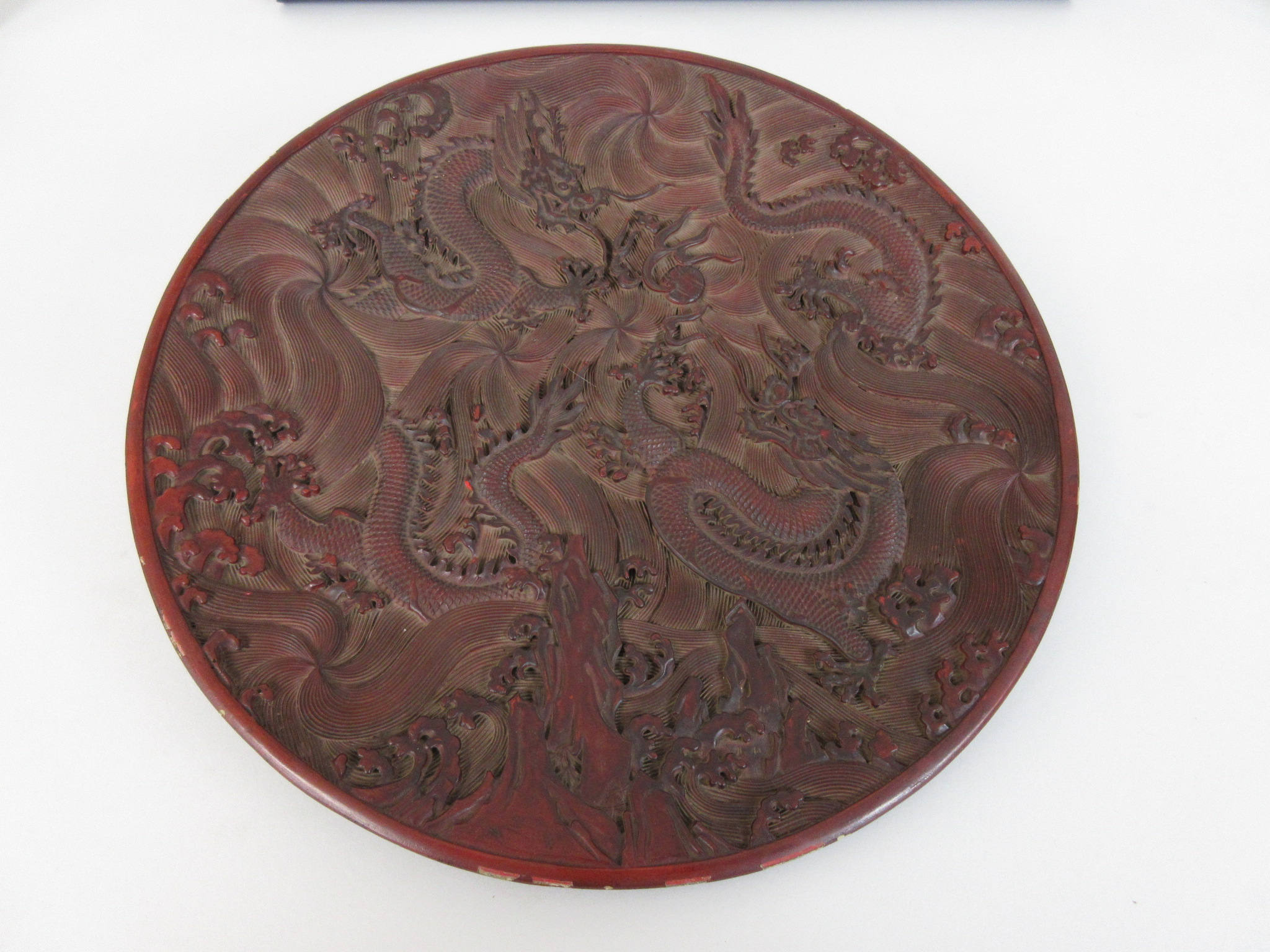 A Chinese Cinnabar Lacquer Double Dragon Tray,Bearing six character Qianlong mark,The circular