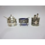 A George IV silver pierced drum Mustard Pot with blue glass liner, London 1823, an oval Mustard Pot,