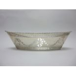 A George V silver pierced oval Cake Basket with gadroon rim, Chester 1910, 12in