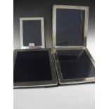Four modern silver easel Photograph Frames, one 8 1/2in H and three of 12in H