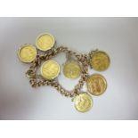 A 9ct gold chain link Bracelet with two Sovereigns 1888 & 1889, plus five Half Sovereigns 1893,