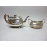 A George III silver boat shape Teapot on ball feet, London 1816, marks worn and a George III two