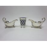 A pair of Edward VIII silver Sauce Boats with leafage scroll handles, Birmingham 1936 and an