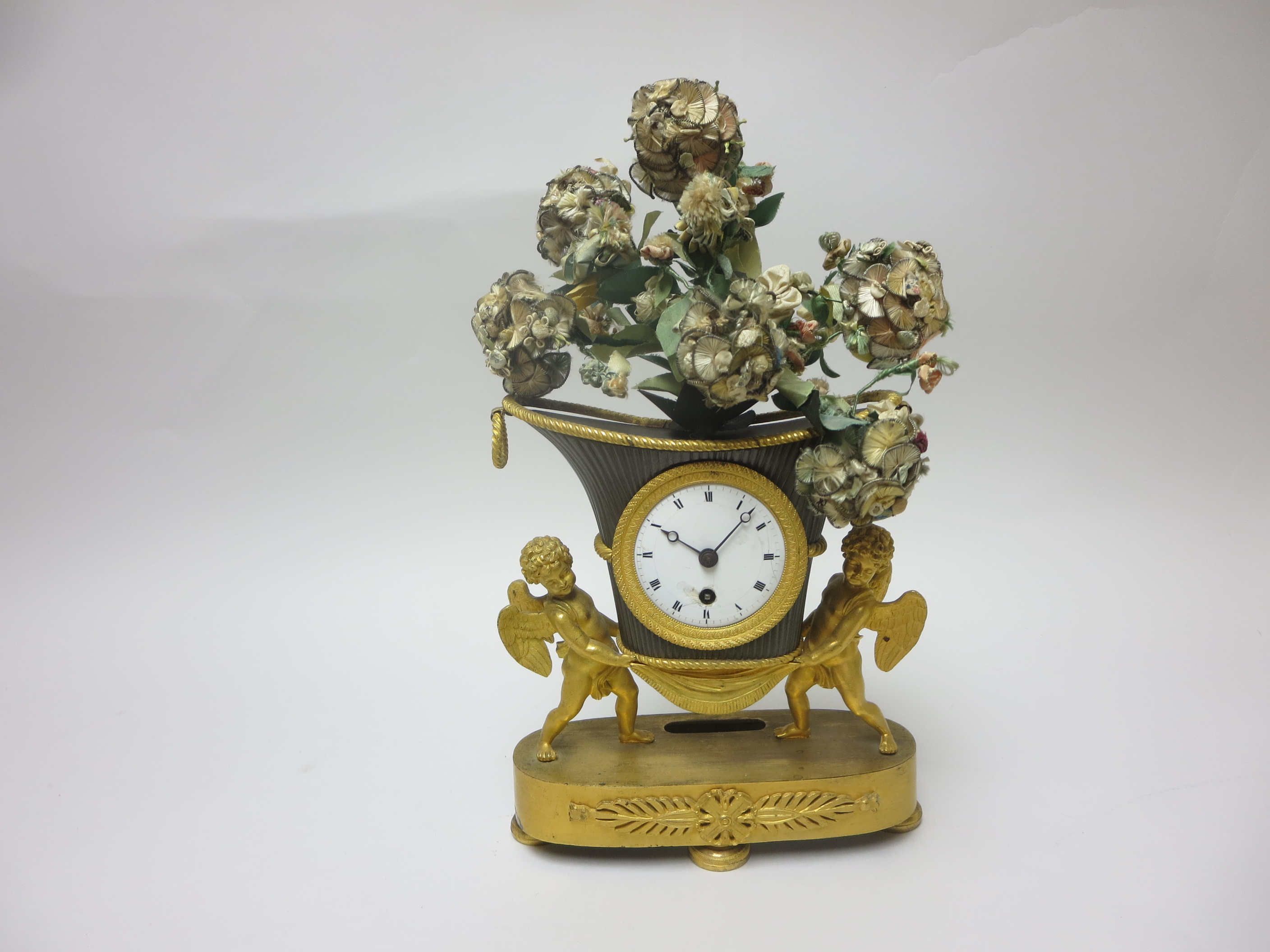 A 19th Century French Mantel Clock with white enamel dial in vase shape surround supported by two - Image 3 of 3