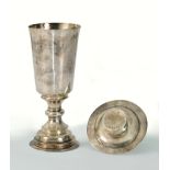 A James I silver Chalice and Paten, the chalice with tapering bucket bowl on single knop stem amd