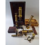 A Cased Brass and Iron Microscope (No Eyepiece), A Cased Field Microscope and One Other.