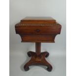 A Regency Rosewood Teapoy with Hinged Lid to Fitted Interior having Gadrooned Border.