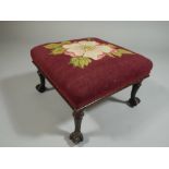 A Pretty Late 19th Century Mahogany Framed Upholstered Footstool with Nicely Carved Claw and Ball