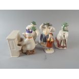 A Collection of Five Royal Doulton Snowman Figures.