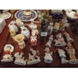 A Collection of Souvenir Fairings, Miniature Vases Etc.