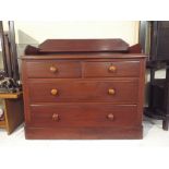 A Stained Pine Wash Stand Chest on Two Short and Two Long Drawers with Raised Gallery.