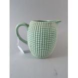 A Clarice Cliff Pineapple Jug by Newport Pottery (AF)