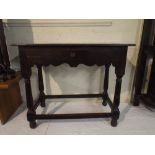 A 19th Century Oak Side Table with Single Drawer on Turned Supports.