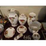 A Collection of Royal Albert Old Country Rose to Include Three Vases, Ginger Jar, Two Bowls,