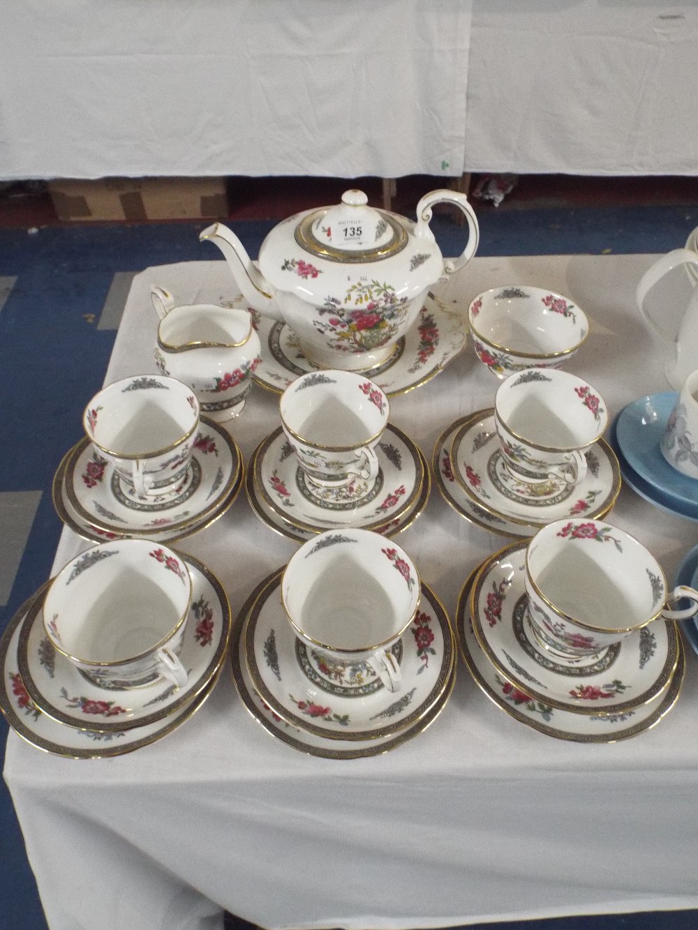 A Paragon Tree of Kashmir Tea Set to Include Six Trios, Bread and Butter Plate, Teapot,