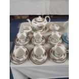 A Paragon Tree of Kashmir Tea Set to Include Six Trios, Bread and Butter Plate, Teapot,