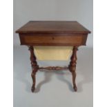A 19th Century Rosewood Ladies Work Table with Single Long Drawer and Pull Out Slide Under.
