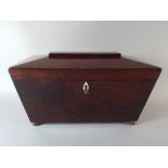 A 19th Century Mahogany Sarcophagus Tea Caddy with Bun Feet. 16.5 Cm High.