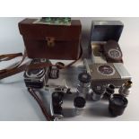 A Bell and Howell Filmo Double Run Eight Cine Camera in Sportster Box (Clockwork Motor Broken)