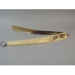 One Bone and One Horn Shoe Horns. The Bone with Musician Decoration. 39cm Long.