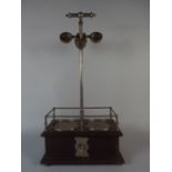 An Interesting Silver Plate Mounted Two Bottle Tantalus Stand The Wooden Base Box with Opening