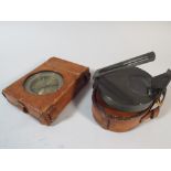 Two Leather Cased Scientific Instruments, Dampened Hand Compass Inscribed FW Breithaupt and Son,