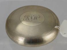 A Gentleman's Silver 'Secret' Snuff Box, of circular design with concentric circles, monogram RNW,