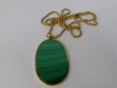 A Lady's 18ct Yellow Gold and Malachite Pendant, Malachite 5 x 3 mm, wt approx 19 gms, initialled