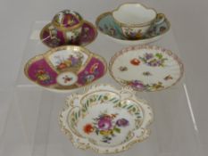 An Augustus Rex (Meissen) Tea Cup and Saucer, painted panels of figures and flowers, underglazed