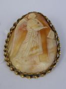 An Antique Lady's Shell Cameo Brooch, depicting an angel, presented in a ribbon gold mount, approx 6