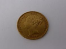 A Victorian Shield Back Half Sovereign, dated 1885.