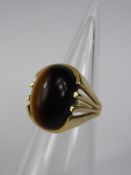 A 9ct Yellow Gold and Tigers Eye Ring, size N, mm HEH, approx 8.1 gms