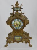 A French Style Brass Chiming Mantel Clock, nr 8328 to movement, with Sevres style porcelain face